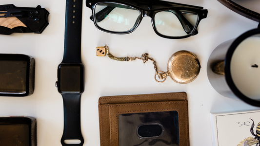 Gifts for Men featuring leather apron and outdoor cook book.