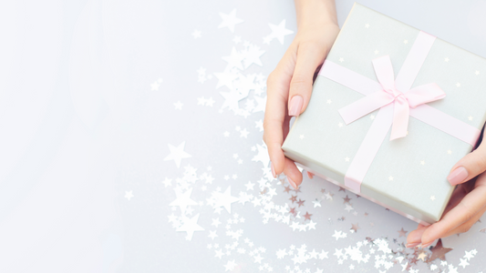Reasons for Gift Giving. Photo of Gift Boxes and satin ribbon.