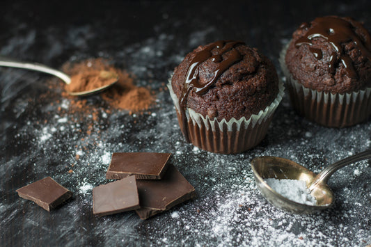 Cupcakes and chocolate on table.  Artisan and craft products made with love and included in Gift Boxes.