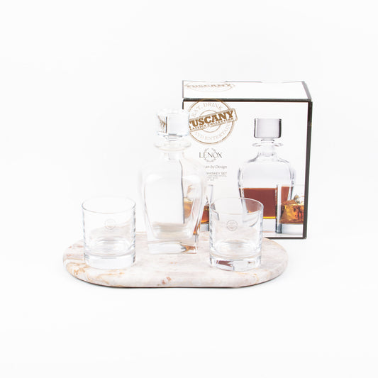 A Tuscany whisky 3 piece set with a decanter, two glasses, and a box packaging, displayed on a marble board (not included).