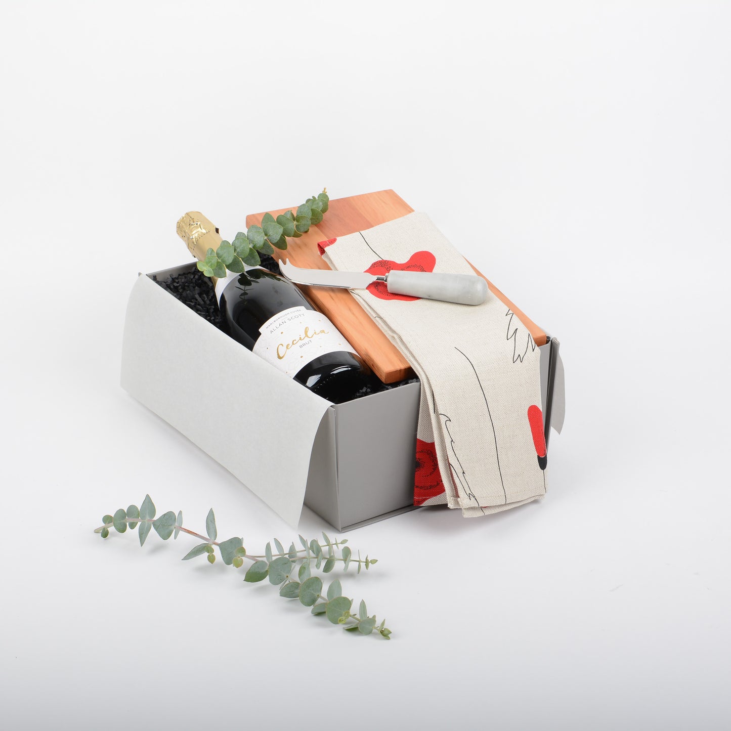 Gift box wiht bubbles, artisan cheeseboard and knife and quality tea towel.