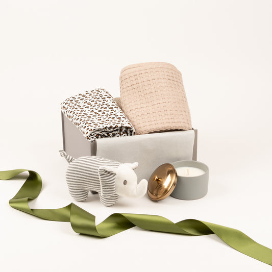 Baby products include blanket and sswaddle, candle and toy.