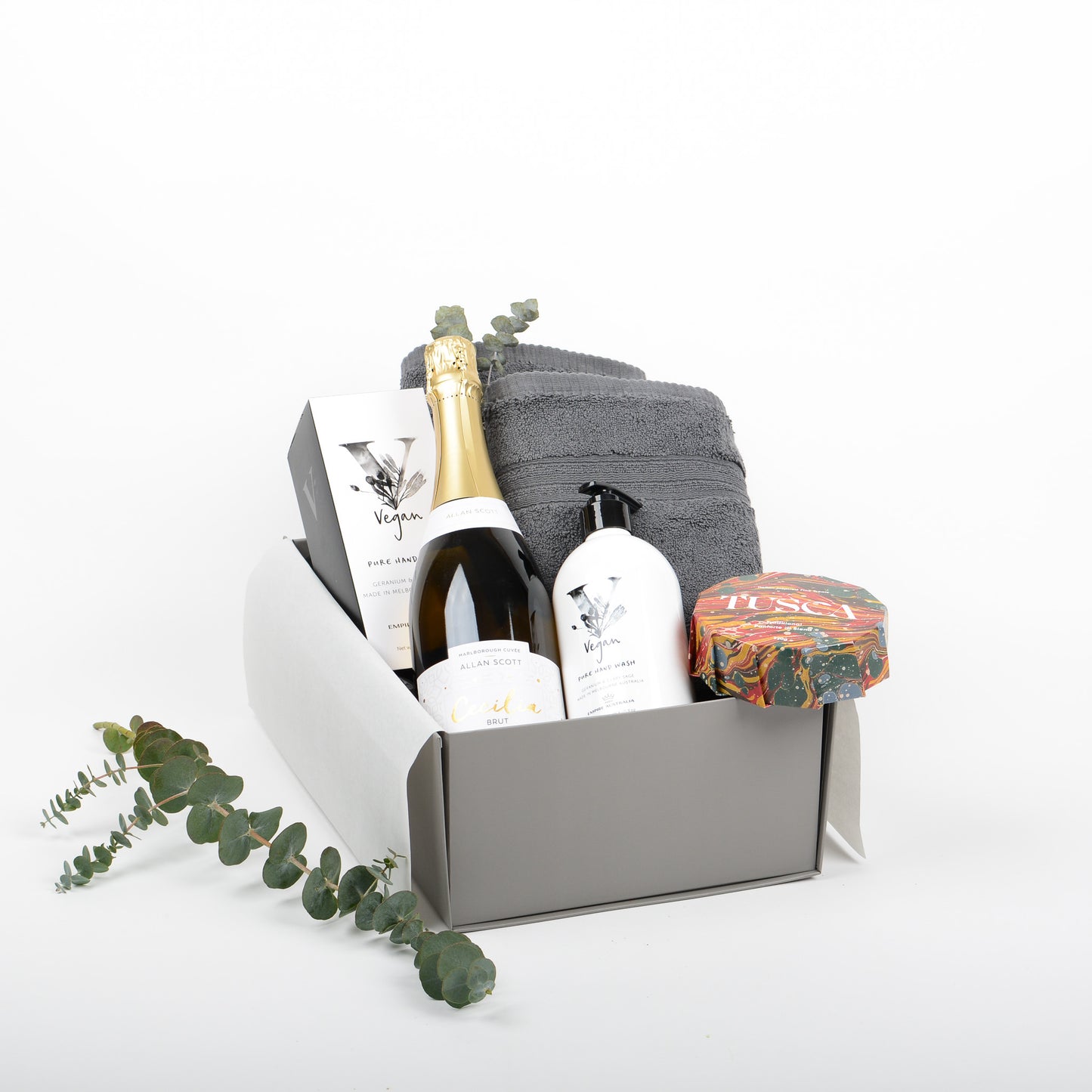 Gift box featuring bubbles, hand wash, hand towels and panforte.