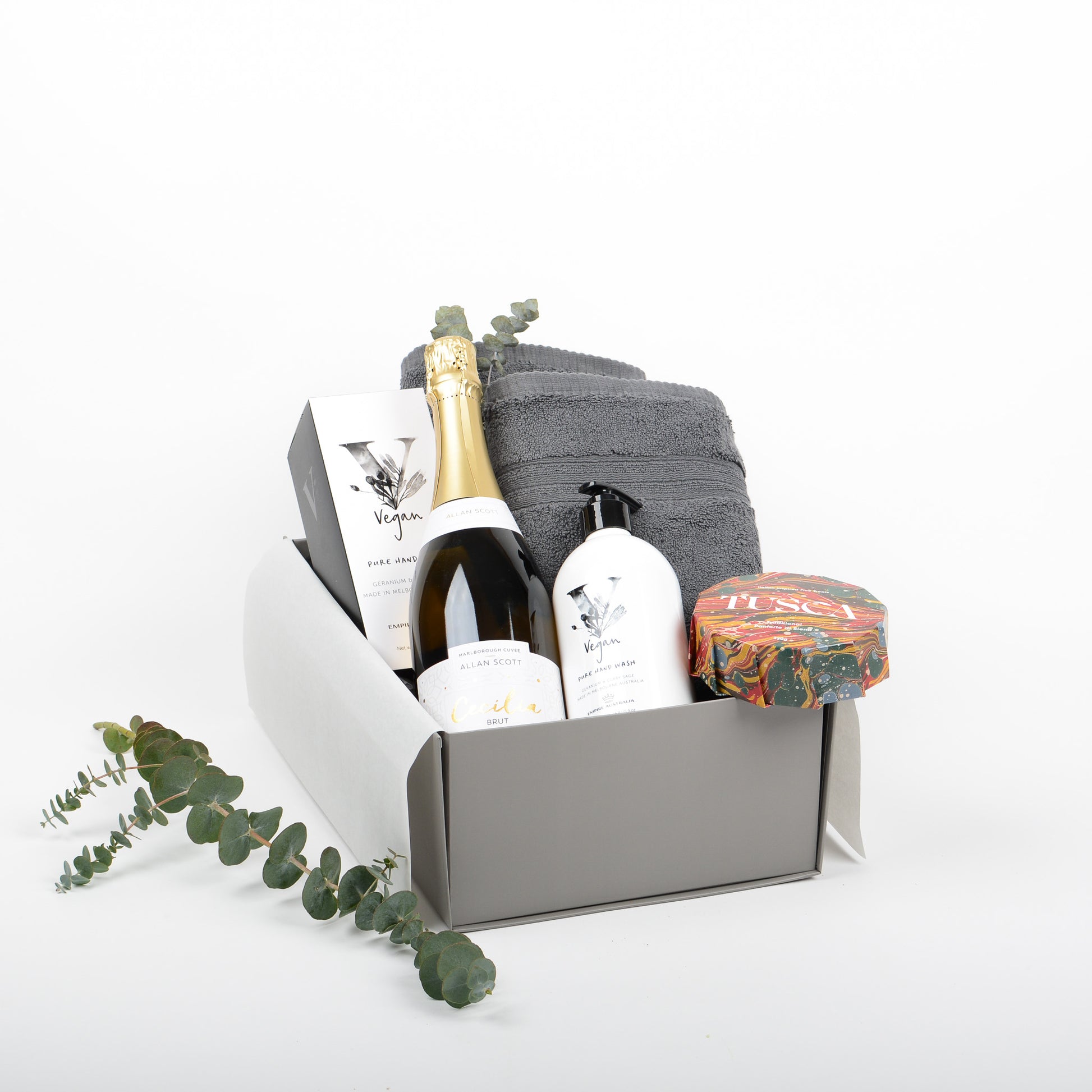 Gift box featuring bubbles, hand wash, hand towels and panforte.