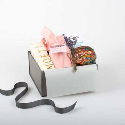 Luxury gift box for her with Moët Champagne, scented candle, and panforte – beautifully packaged and perfect for gifting NZ-wide