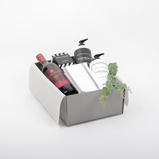 Gift Box included red wine, kitchenware and tea towel.