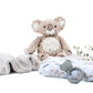 Out of Gift Box products shown are Putty Koala Bear, cotton swaddle and Blanket and silicone teether by Mushie.