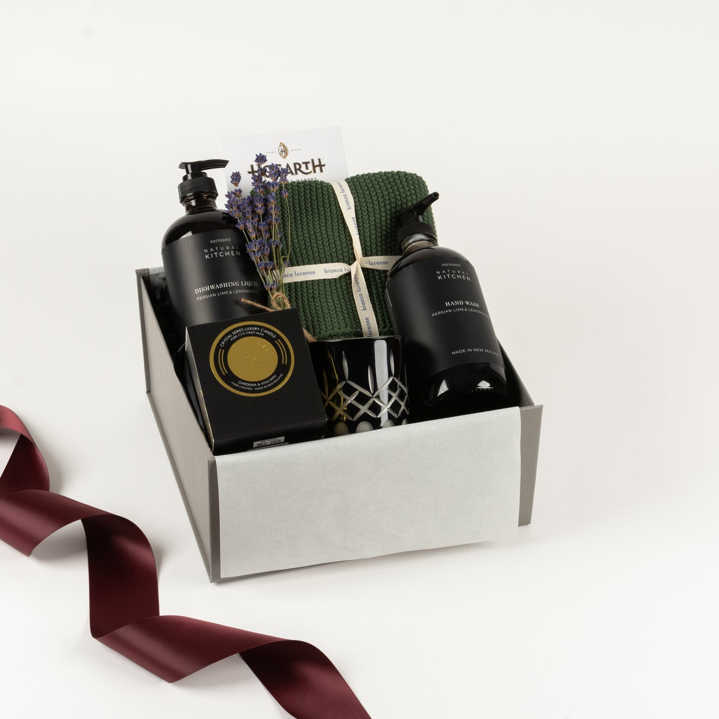  Included in this gift box are a set of cotton washers, natural hand wash, dish wash, crystal candle by Surmanti and craft chocolate tablet by Hogarth.