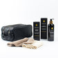 Gifts shown out of gift box are leather washbag, two facecloths, body wash, shaving gel, skin hydrator.