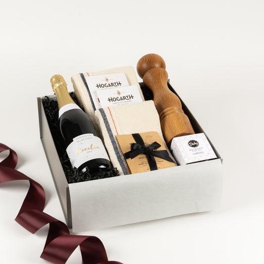 Choice Home - Gift Boxes NZ - Gifts of Distinction. Included in this gift box are 2x handwoven tea towels, spices, Torino oak mill, craft chocolate tablets by Hogarth and bubbly by Allan Scott.