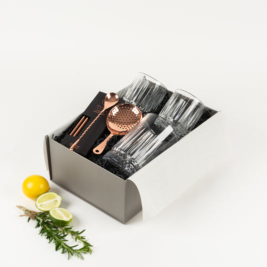 Mixology - Gift Boxes NZ - Gifts of Distinction.  Included in this gift box are 2 glasses and mixer beaker, copper strainer and spoon with copper reusable straws.
