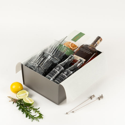 Old Fashioned - Gift Boxes NZ - Gifts of Distinction.  Featured in this gift box are 2 tumblers, 2 soda waters, Woodford Reserve Bourbon, swizzle sticks and cocktail garnishes.