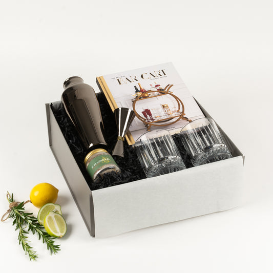 Shake It Up - Gift Boxes NZ - Gifts of Distinction.  This box includes a Bar Cart book, 2 tumblers, Parisienne shaker and jigger and cocktail garnish. 