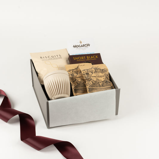 Coffee Break Petite - Gift Boxes NZ - Gifts of Distinction. Gift box includes almond biscuits, coffee cup, Hawthorne coffee sachets and chocolate treats.