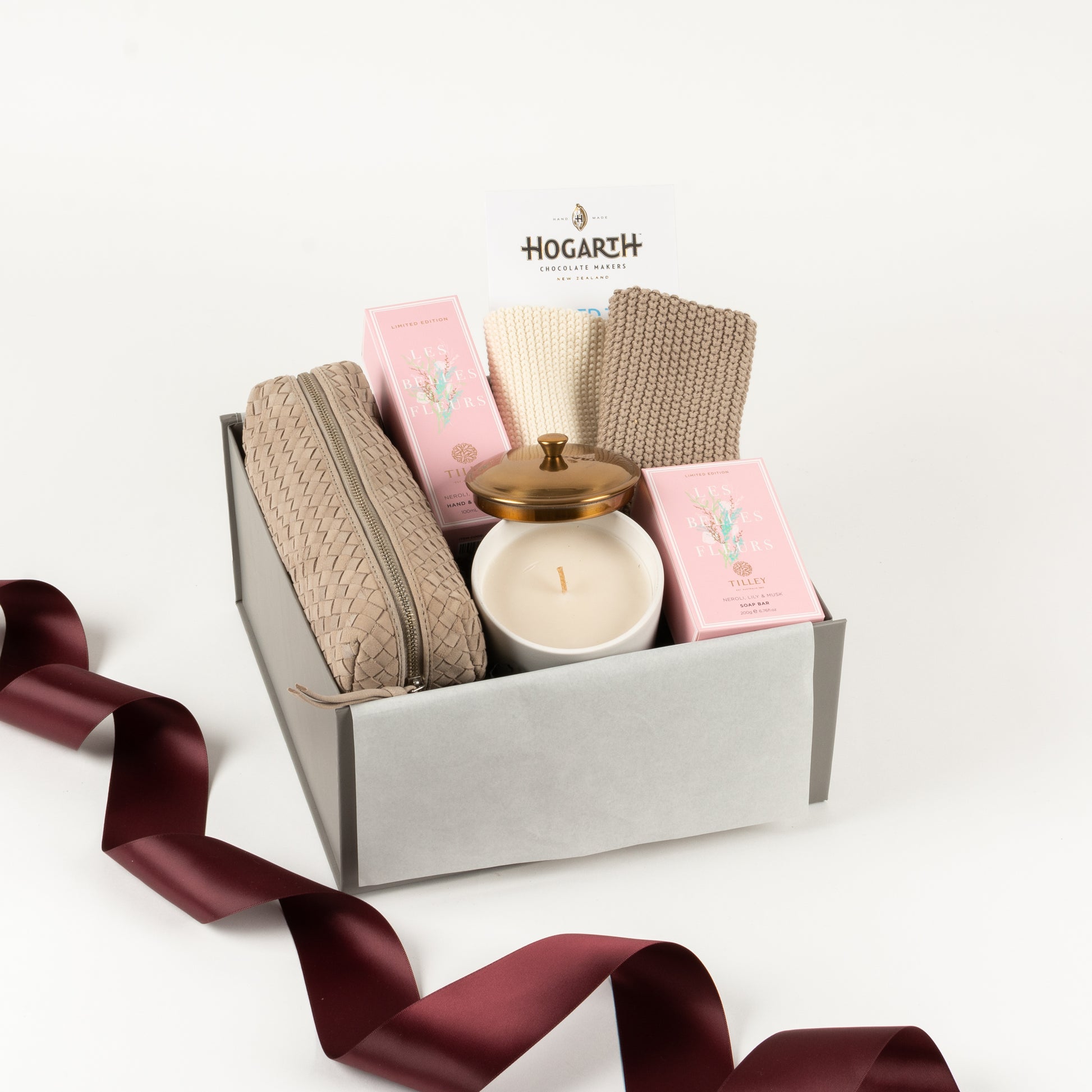 La Belle - Gift Boxes NZ - Gifts of Distinction.  This gift box includes soap and hand cream by Tilley, hygge candle, craft chocolate tablet by Hogarth,a set of cotton washers and a woven leather pencil or makeup pouch.  