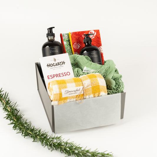 Eco Brights - Gift Boxes NZ - Gifts of Distinction. Featured in this gift box is a sustainable produce bag and wash cloths, hand wash, dish wash, stonewashed cotton tea towel and a craft chocolate tablet by Hogarth.